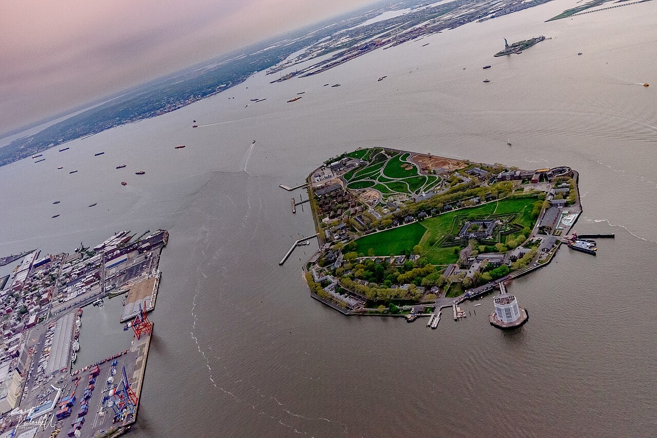 Aerial view of Governors Island and New York Harbor at sunset