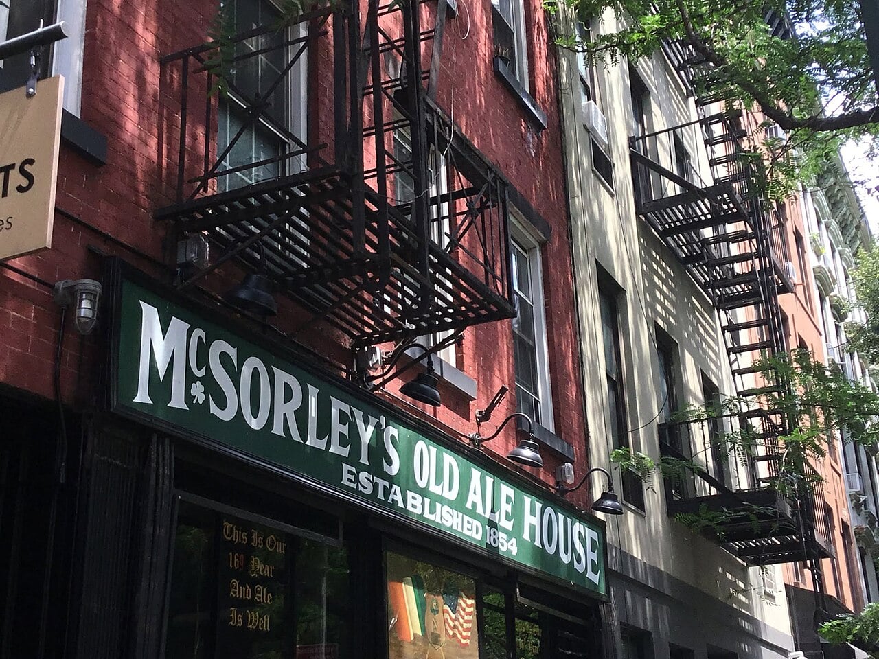 Green McSorley’s sign on the brick facade on East 7th Street