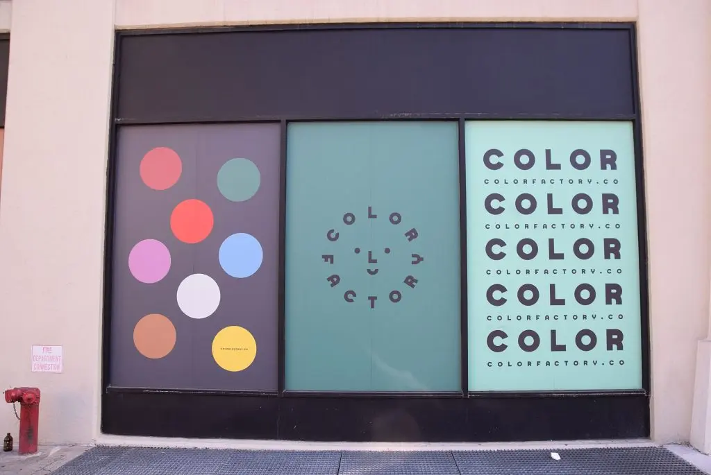 Color Factory’s colorful window signs on Spring Street